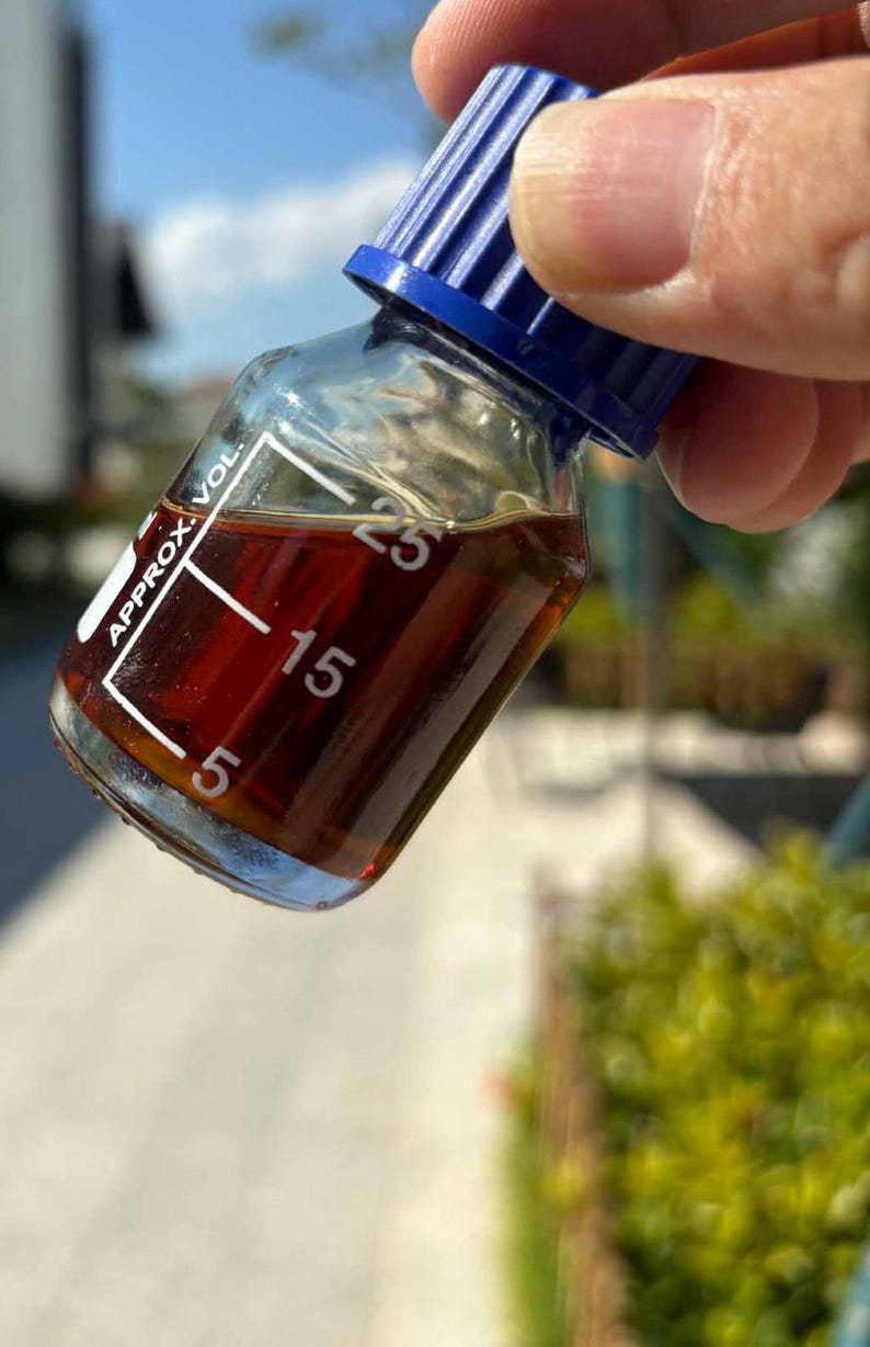 Hainan Insect Oud Oil bottle with volume markings